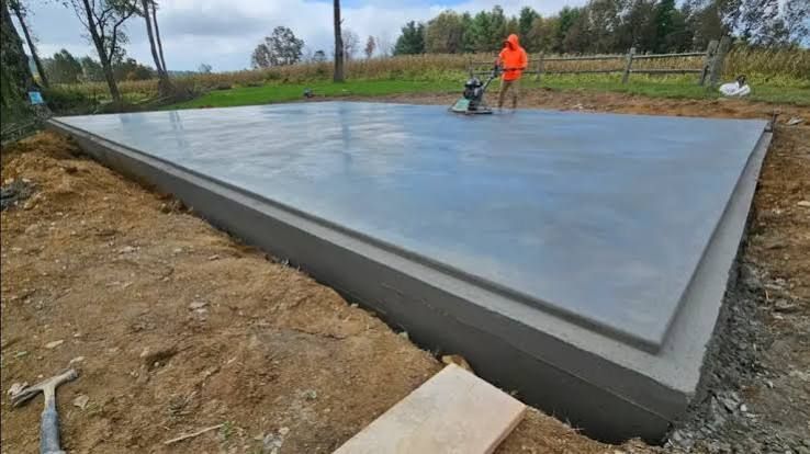 Metal building concrete slab foundation poured and finished by La Ross & Son