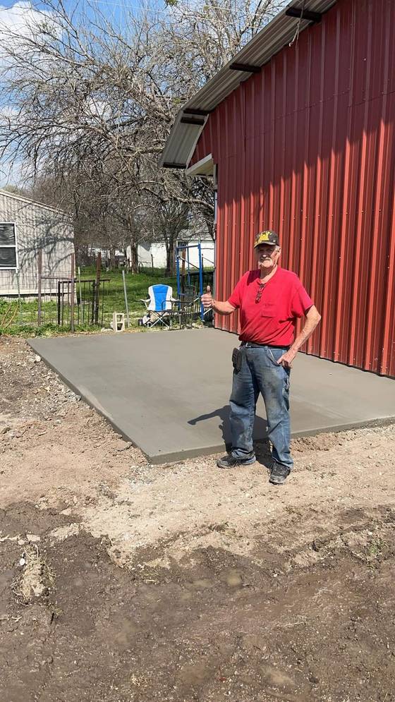 Satisfied customer with metal building slab